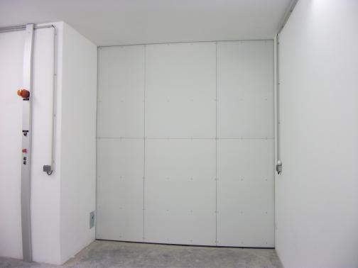 Institut de Soudure - France - Main door for industrial radiography bunker. 2.7m x 3.0m; Lead 85mm; Weight 10t.