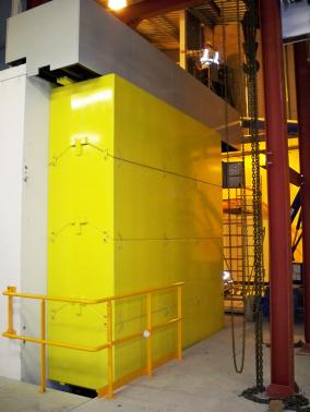 Diamond Light Source - Didcot - England - Door made of steel caissons filled with concrete; Thickness 1m; Weight 40tonnes.